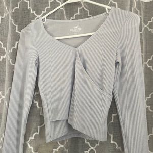 Cute light blue cross cross long sleeve crop top size XS Hollister